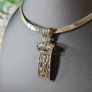 Elegant Silver and Gold Pendant Necklace